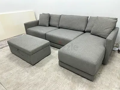 Like new condition crate&barrel grey color sofa with footstool