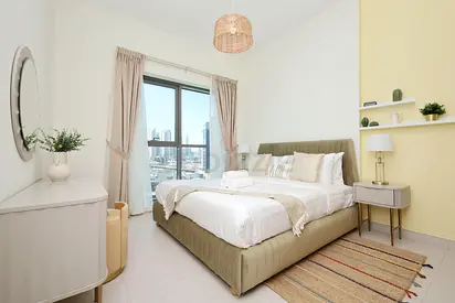 Urgent sale:Beautiful modern queensize Bed, mattress,2side tables, 2lamps, mirror and dresser w seat