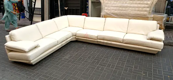 NATUZZI Cream Leather L-Shaped Corner Sofa — Seats 6-7, Good Condition