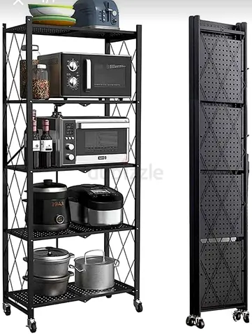 Foldable Metal Kitchen Storage Rack on Wheels - 5 Tier. Never used. Brand new. Bcz of storage, we ar