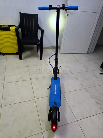 Used electric scooter - working, blue, compact for city rides