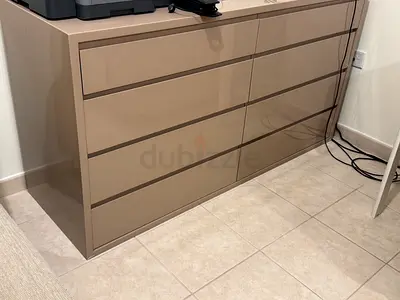 Modern beige 8-drawer dresser - good condition.
