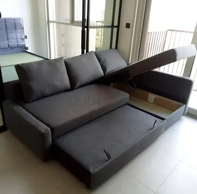 Gray L-shaped storage sofa bed with pull-out trundle (good condition)