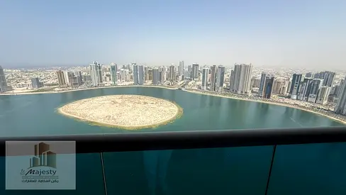 For Sale Stunning View of Al Mamzar Lake in Sharjah 2 Bedrooms Large Living Room Additional Lounge with Balcony