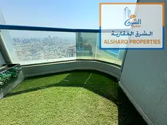 Two bedrooms, a living room, and two bathrooms; features include built-in wardrobes, central air con