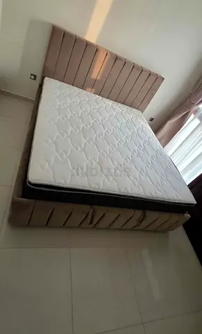 Queen upholstered bed frame with mattress - good condition