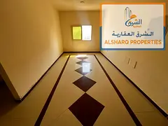 Ajman Corniche – Second row! Spacious 2-bedroom apartment with a living room, featuring a master b
