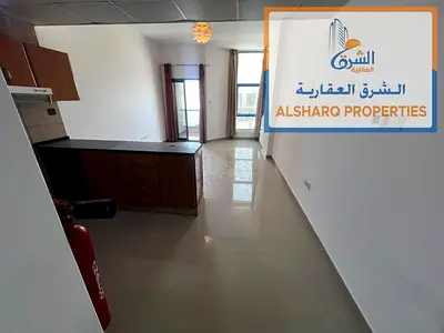 Studio in Al Nuaimiya Tower C: Open-plan kitchen, balcony, excellent view, central A/C, private parking. 22,000.