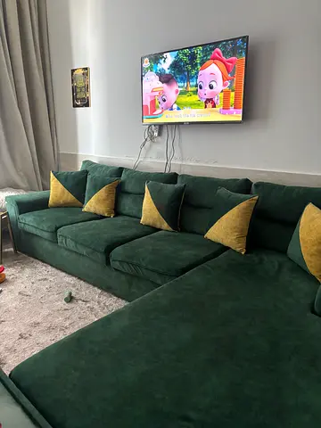 Green 3-seater sofa with cushions - good condition