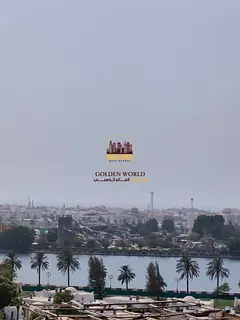 Two-bedroom apartment in Al Majaz 1 with 2 master rooms, maid room, 4 balconies, sea view and built-