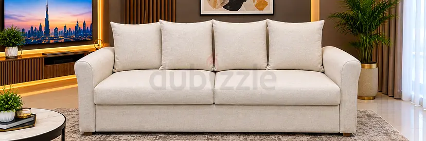 Light beige 2-seater fabric sofa bed in excellent condition with 4 pillow