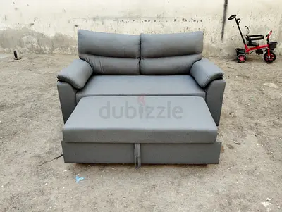 Compact 2-Seater Grey Fabric Sofa Bed with Pull-Out Storage