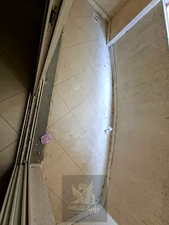 For rent in Al Taawun Sharjah, 2 bedroom apartment with 2 master rooms, 3 bathrooms, 2 balconies and