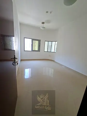 A spacious apartment is available for annual rent in Al Taawun, Sharjah, located in a prime area close to essential services and facilities.
