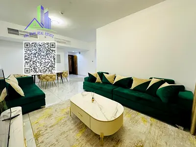 Newly furnished 2-bedroom apartment in Al Nuaimiya 1, Ajman, featuring 2 bathrooms, balcony, central AC and private parking, beside Al Ain Markets and
