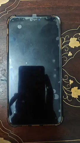 Used iPhone with screen protector and case - good working condition