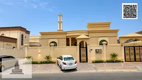 Villa for sale in Al Rawda, Ajman, featuring 3 master bedrooms, a majlis, a living room, and a maid'
