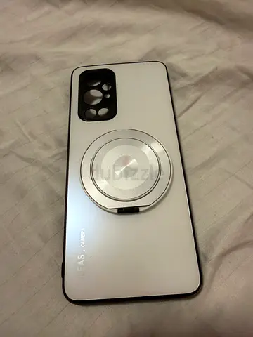 OnePlus 9 Pro smartphone with magnetic ring holder