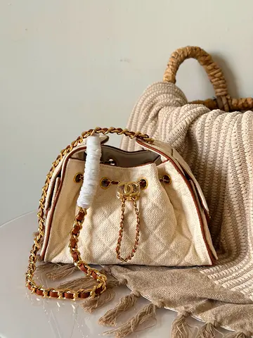 Cream Quilted Bucket Bag with Gold Chain Strap