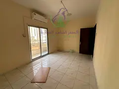 Apartment for Rent in Al Majaz 2, Sharjah A spacious two-bedroom apartment with a living room, locat