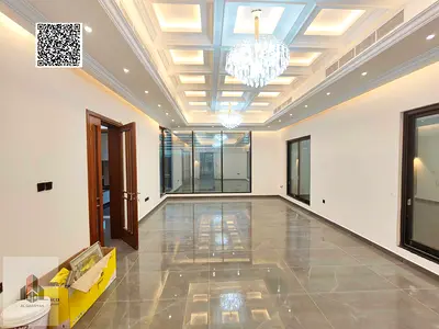 Spacious villa for sale opposite a mosque at an excellent price, including water and electricity connections and air conditioning units.