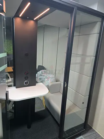 Used Glass Phone/Meeting Booth with Built-in Lighting and Table Hushoffice HushMeet
