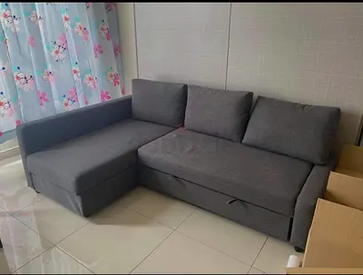Gray L-shaped Sofa with Storage - Good Condition