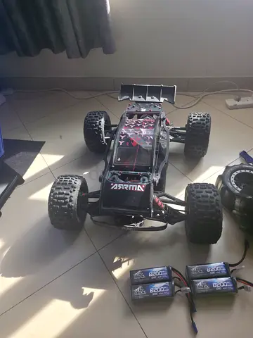 Used Arrma Outcast 8s with spare sand tires and 4 batteries and upgrades