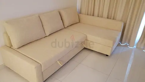 Beige L-shape Fabric Sofa bed with Storage - Good Condition