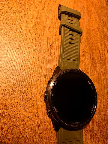 Garmin 970 multisport GPS watch with green silicone strap - used