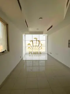 Spacious Studio for Annual Rent in Al Liwara, Ajman, Separate Kitchen, Central AC, Prime Location Op