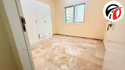 Spacious 1 Bedroom in Muraqqabat with Parking .