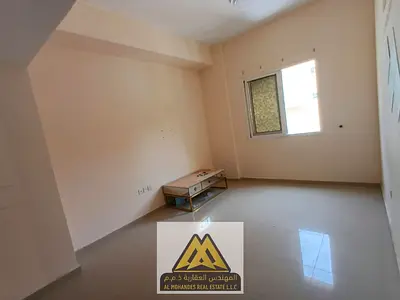 Bedroom Living room Spacious layout and practical design Family-friendly building in a quiet residential area Prime location near Ajman University