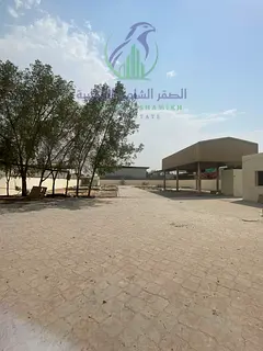 Industrial Yard for Rent in Sajaa | 20,000 Sq. Ft. | Interlock Flooring | 32 kW Power | Covered Shed