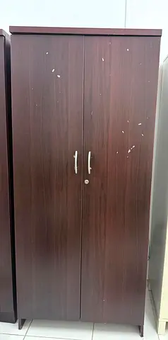 Two-door wooden wardrobe / armoire in dark brown - used