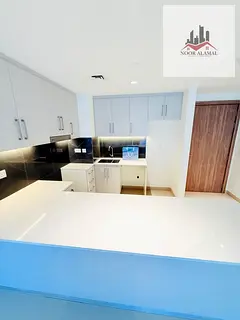 For sale in Maryam Island, Al Mamzar, Sharjah: A spacious 2-bedroom apartment with a living room. It
