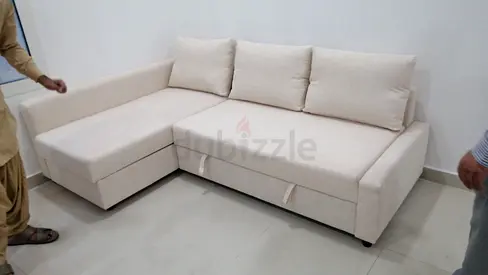 Beige L-shaped Sofa bed with Storage - Good Condition