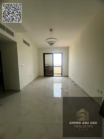 Luxury 2BR Hall apartment for annual rent in Al Rawda 3 Ajman; master room, 3 baths, storage, 2 balconies, open view, spacious layout and modern finis