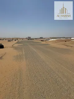 For sale: 'Al-Sahma' residential land in Sharjah, freehold for all Arab nationalities. Strategically
