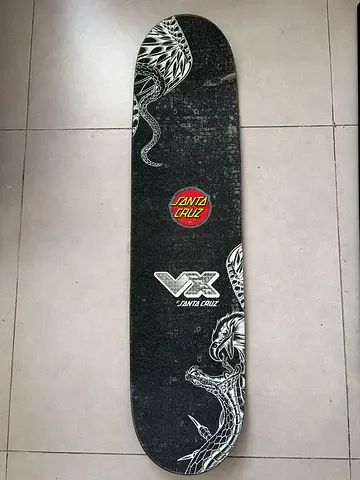 8.25 Santa Cruz carbon fiber skate board (only deck) with clear grip tape