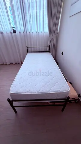 Single bed and mattress