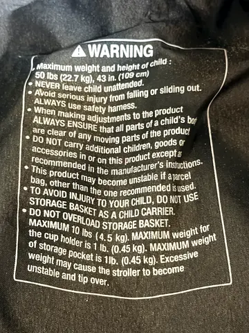 Baby Stroller - Lightweight Foldable (used) - Warning Label shown