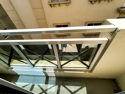 NEW MUWAILEH CLOSE TO ZAHIA 1 BHK 2 FULL BATH WARDROBE BUILT-IN COVERED PARKING FOR FAMILY ONLY