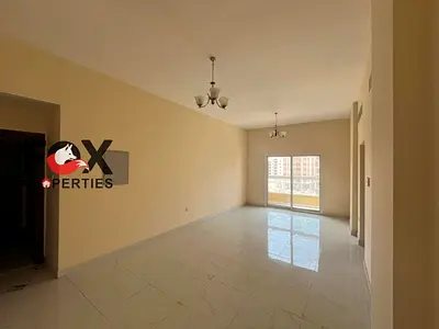 1BR + living for annual rent in Al Jurf 3, Ajman. Master bedroom, 2 baths, built-in wardrobes. AED 33K, 4/6 payments, AED 2K cheque deposit.