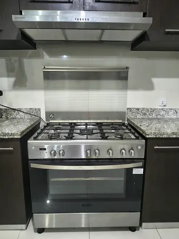Frigidaire Cooking Range and Chimney Hood for Sale