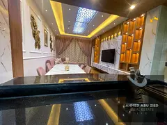 A beautiful, high-end, fully furnished 2-bedroom and living room apartment for annual rent at Ajman
