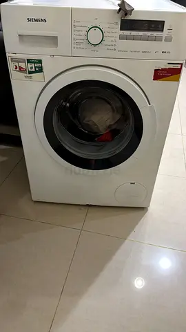 Siemens front load washing machine - working fine, only problem is water leaks from side