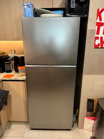 Used stainless steel top-freezer refrigerator - good condition