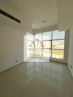 Studio for annual rent in Al Liwara, with a separate kitchen, central AC, spacious layout, opposite 