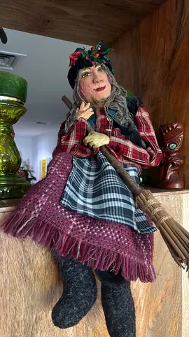 Handcrafted vintage witch figurine with broom and textile dress